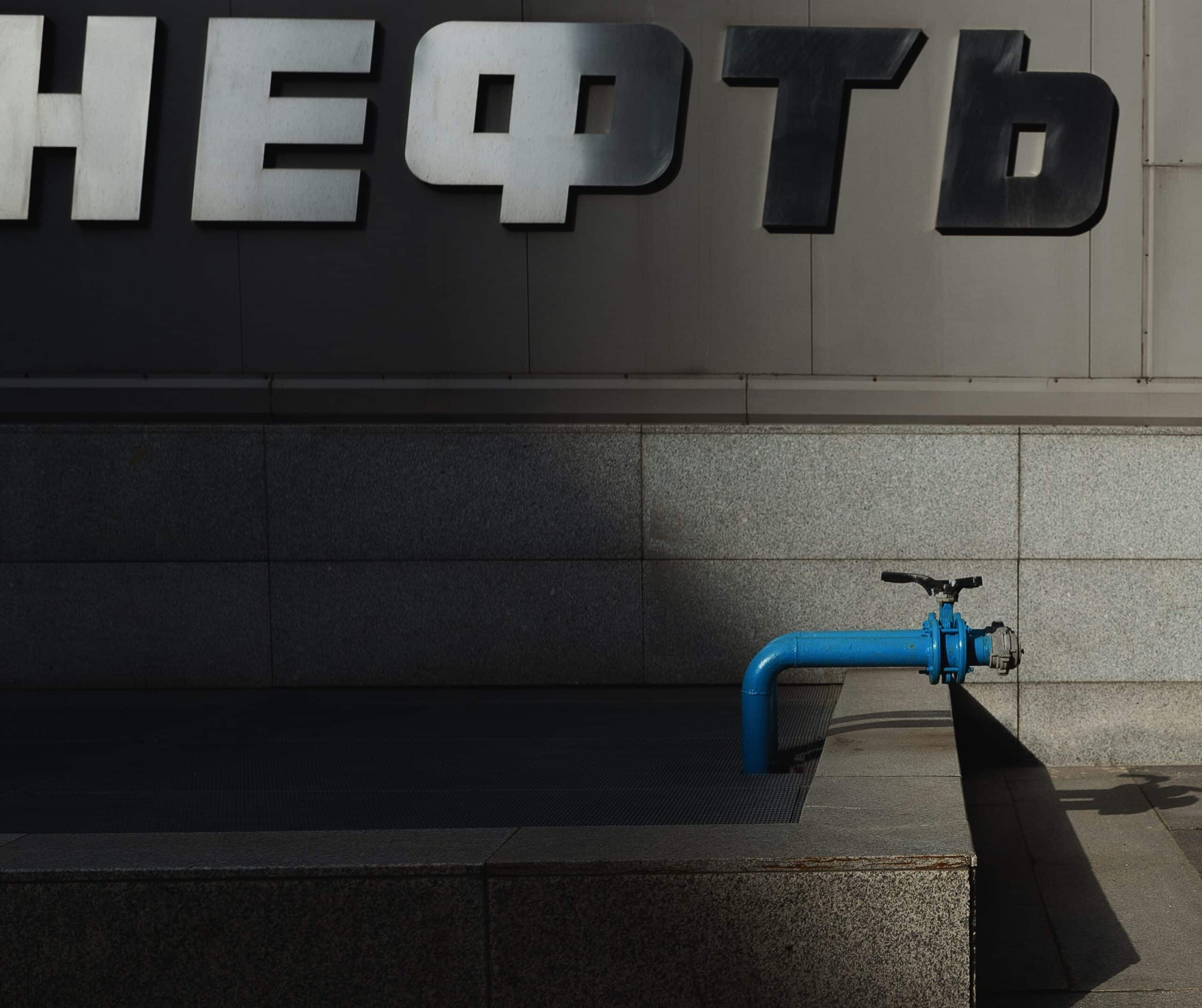 a blue bike parked in front of a building