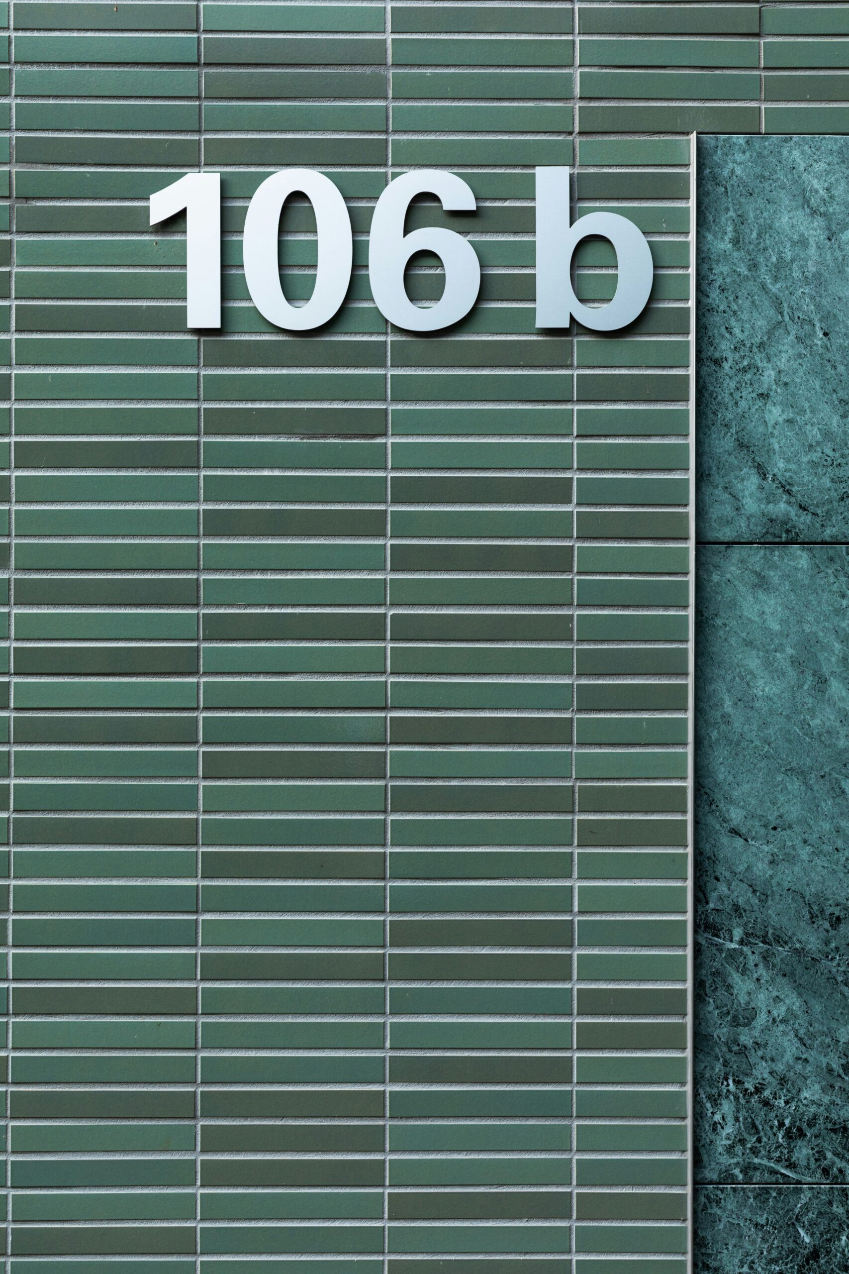 white and gray wall with number