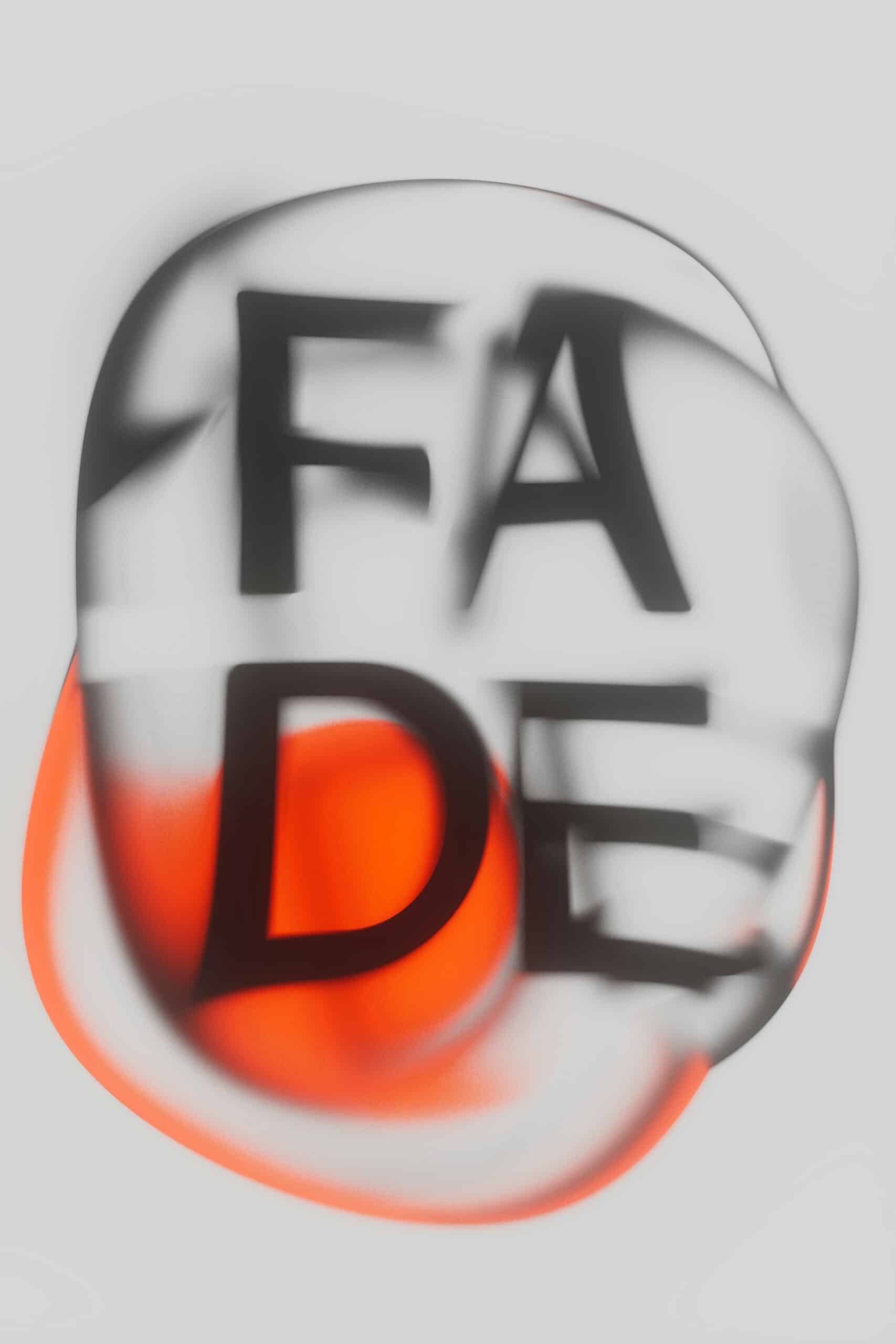 The word "fade" blurred over a bright orange circle.