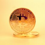 A close-up of a golden Bitcoin highlighting its digital currency design.