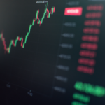 Close-up of a fluctuating cryptocurrency market chart showing stock prices on a digital screen.