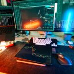 Vibrant trading setup with multiple screens displaying cryptocurrency charts and data analysis tools.